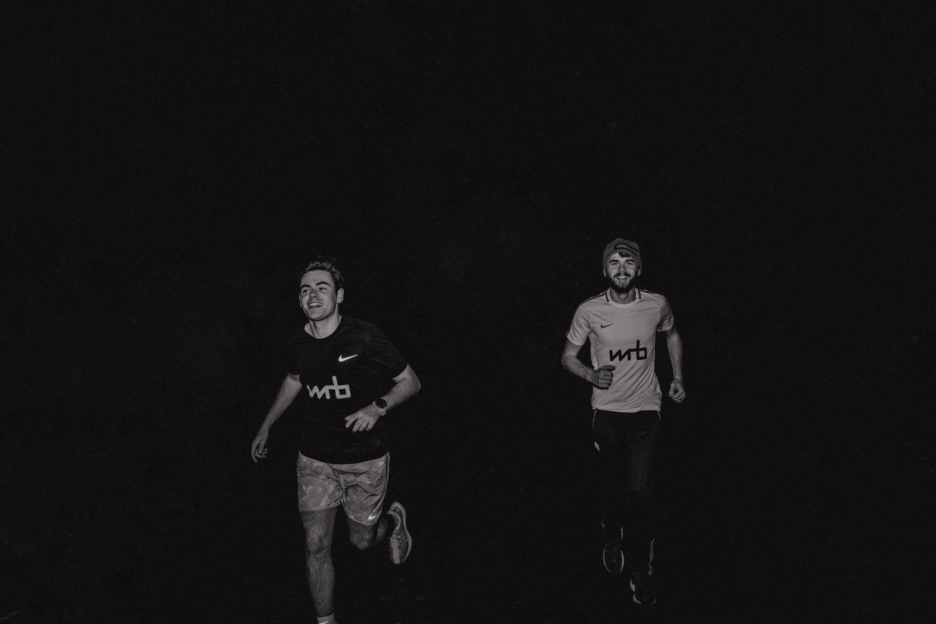 Runners In The Dark Background