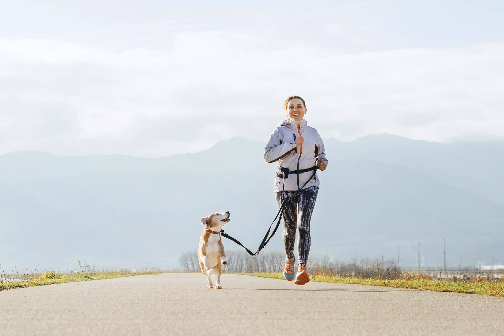 Running Woman With Dog Background