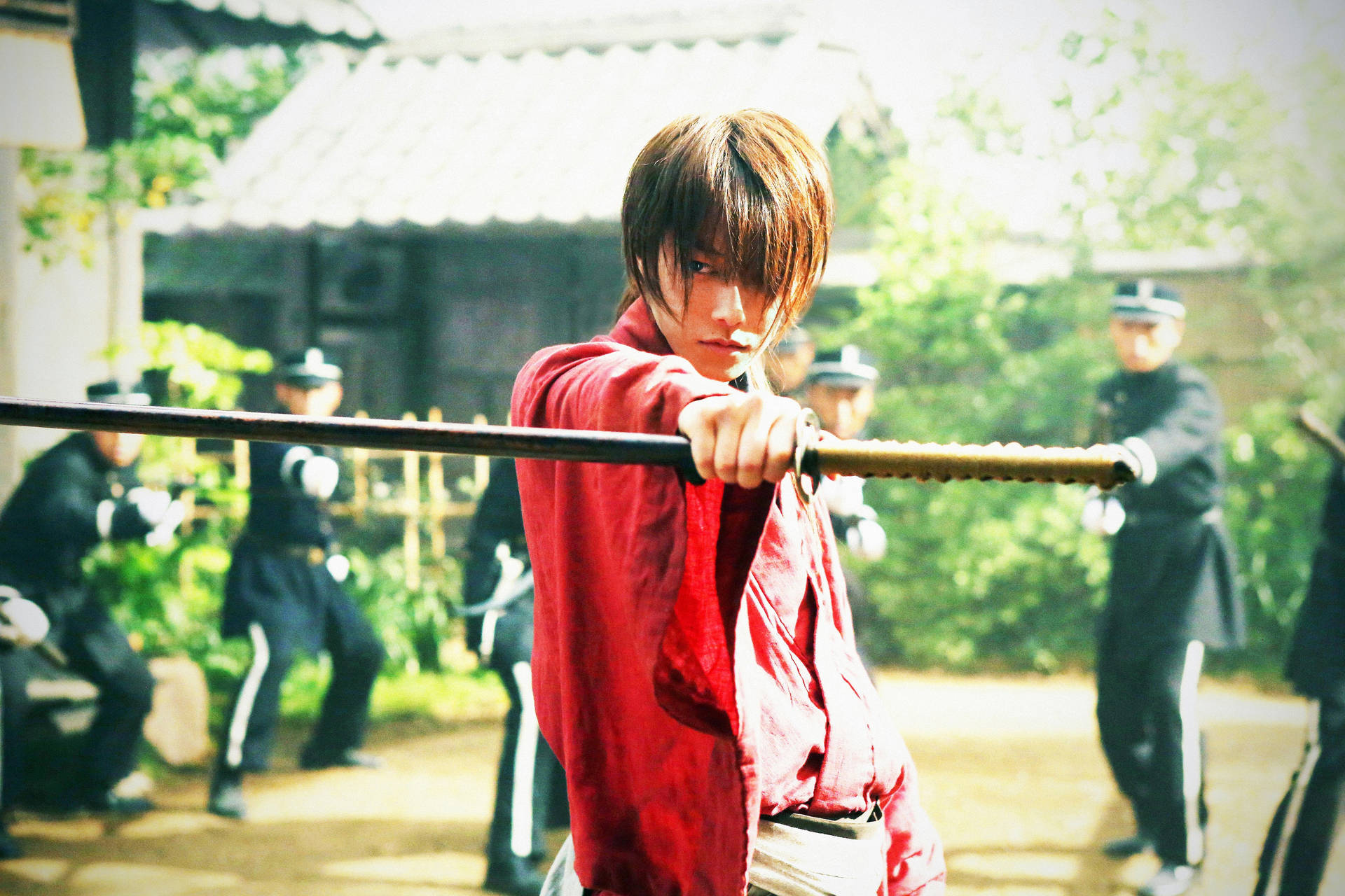 Rurouni Kenshin Wielding Reverse Blade Sword Background