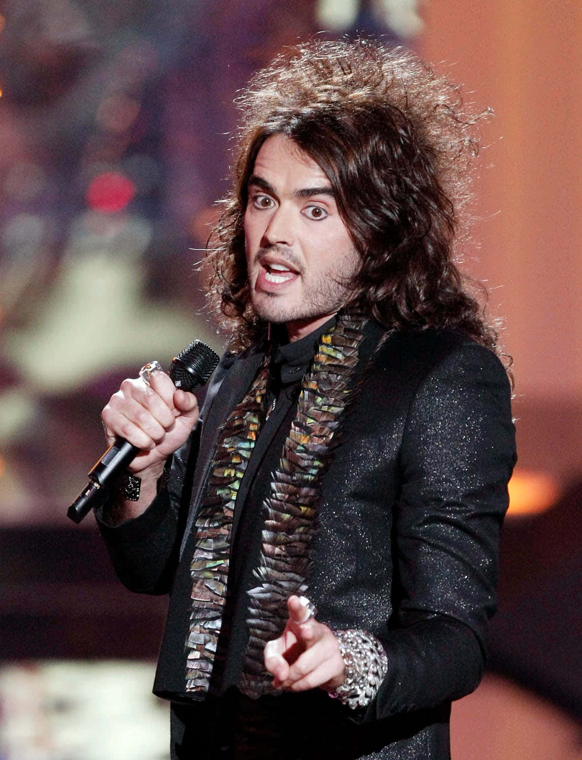 Russell Brand Enthralling Audience With His Stand-up Comedy Background