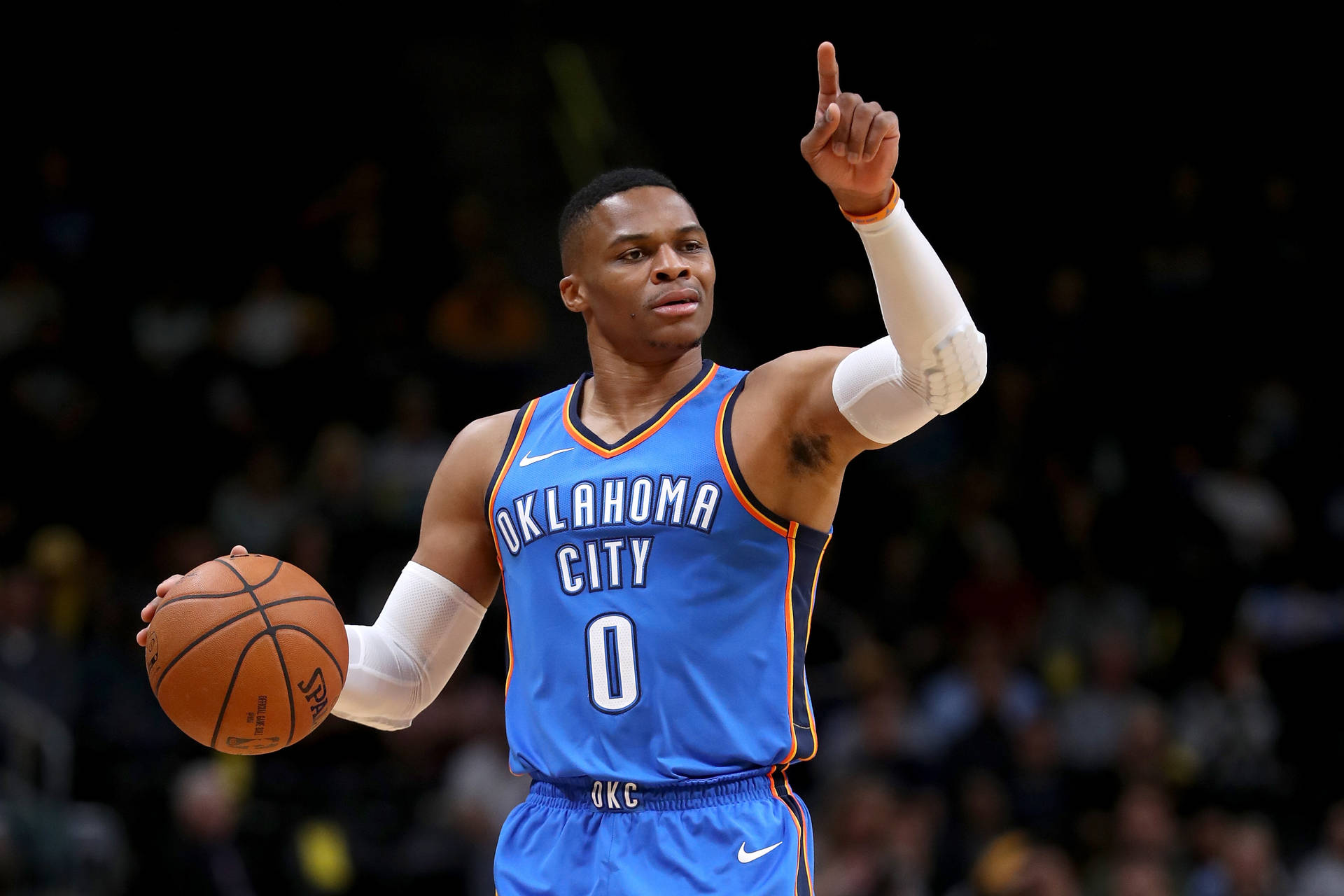 Russell Westbrook In Blue Oklahoma Jersey Background