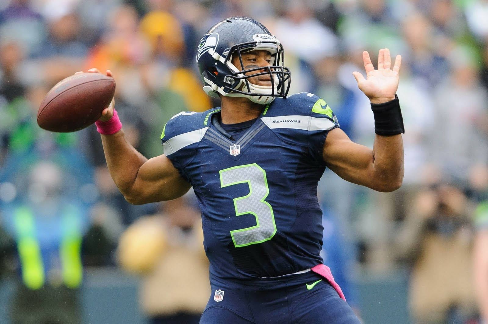 Russell Wilson In Ball Throwing Position Background