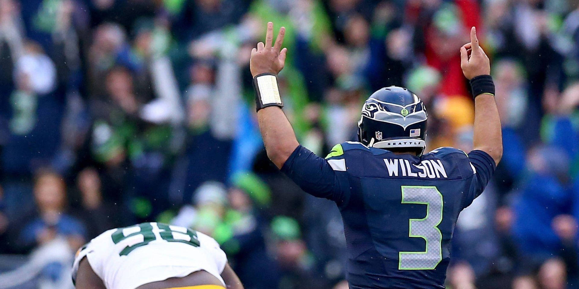 Russell Wilson Peace Sign Background