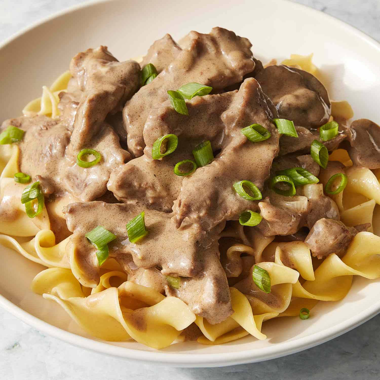 Russian Cuisine Beef Stroganoff With Fusilli Background