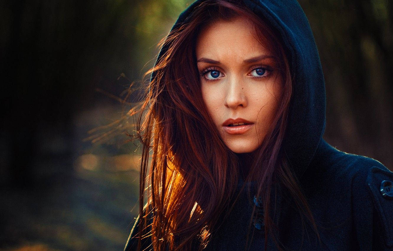 Russian Girl Wearing Blue Hoodie Background