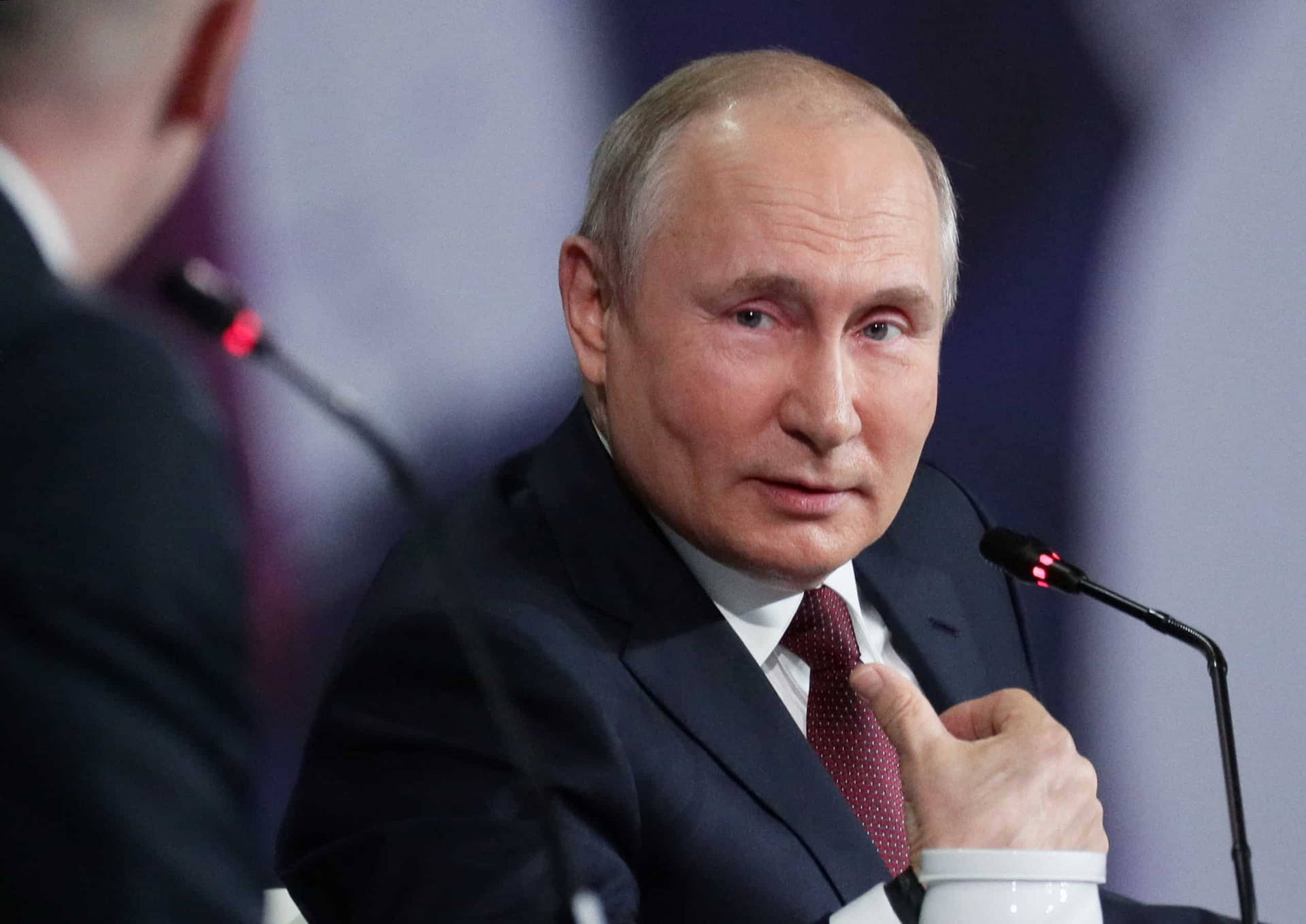 Russian President Vladimir Putin Listening Attentively