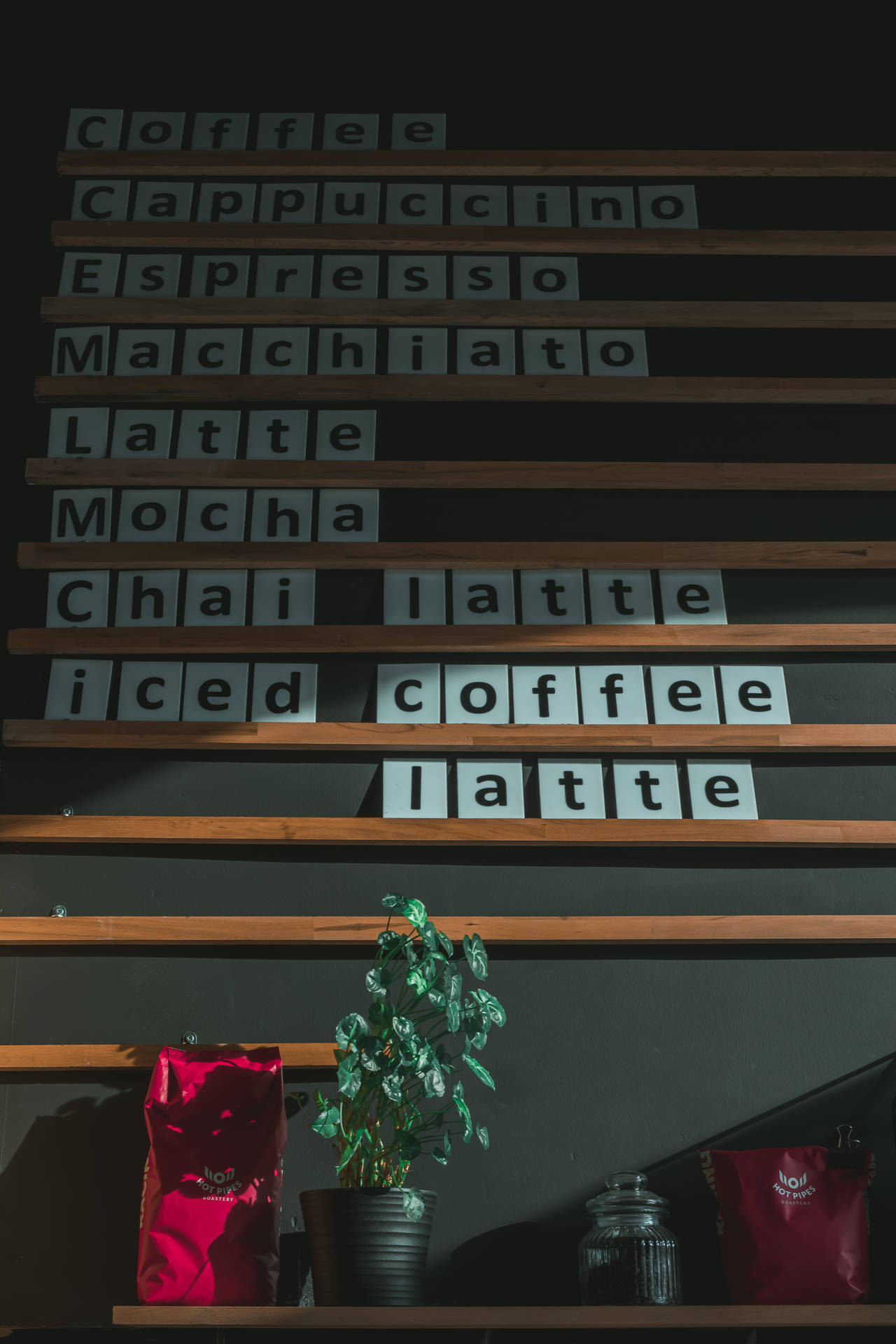 Rustic Coffee Shop Menu Displayed On Wall