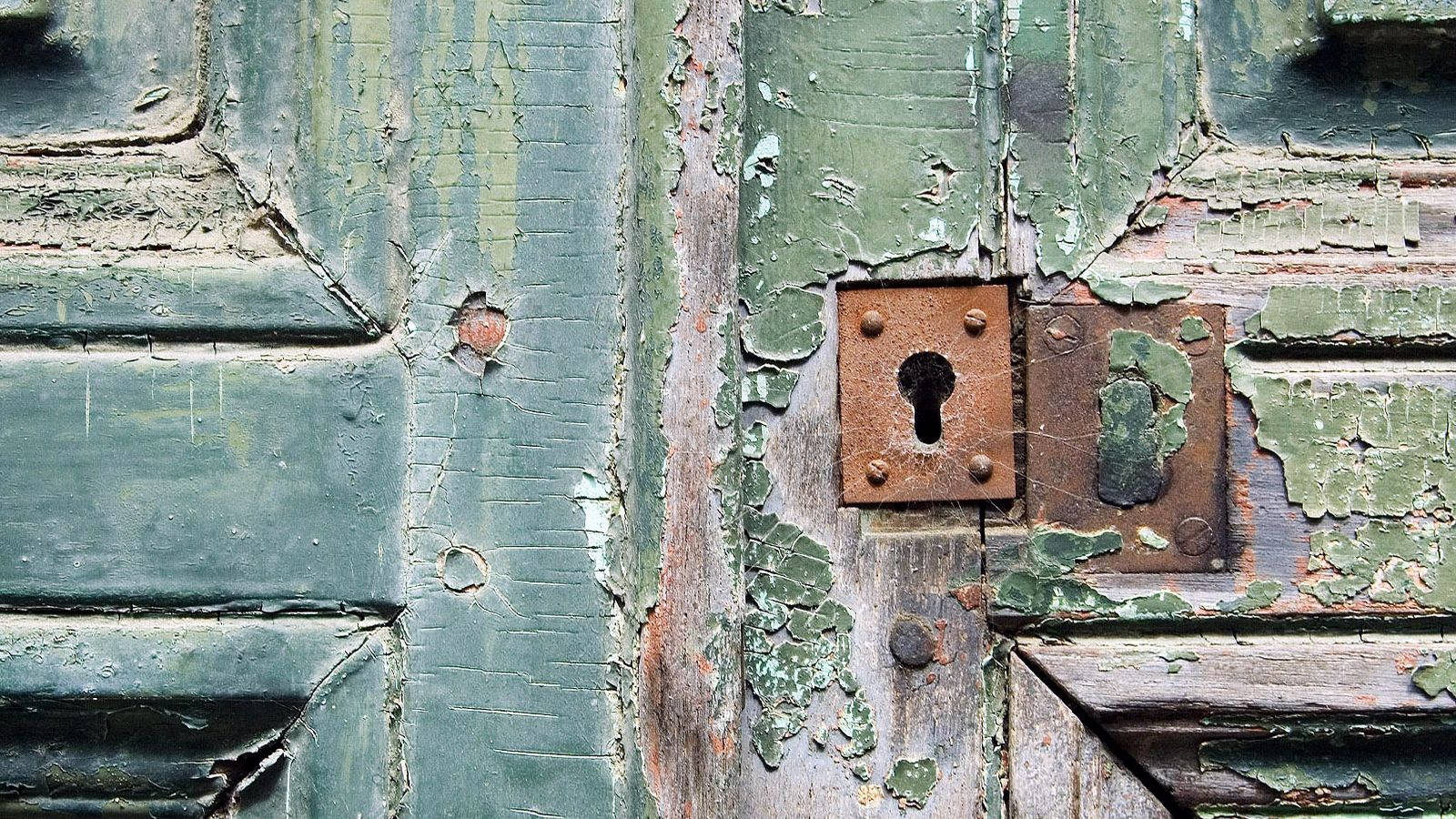 Rusty Keyhole Of An Ancient Door