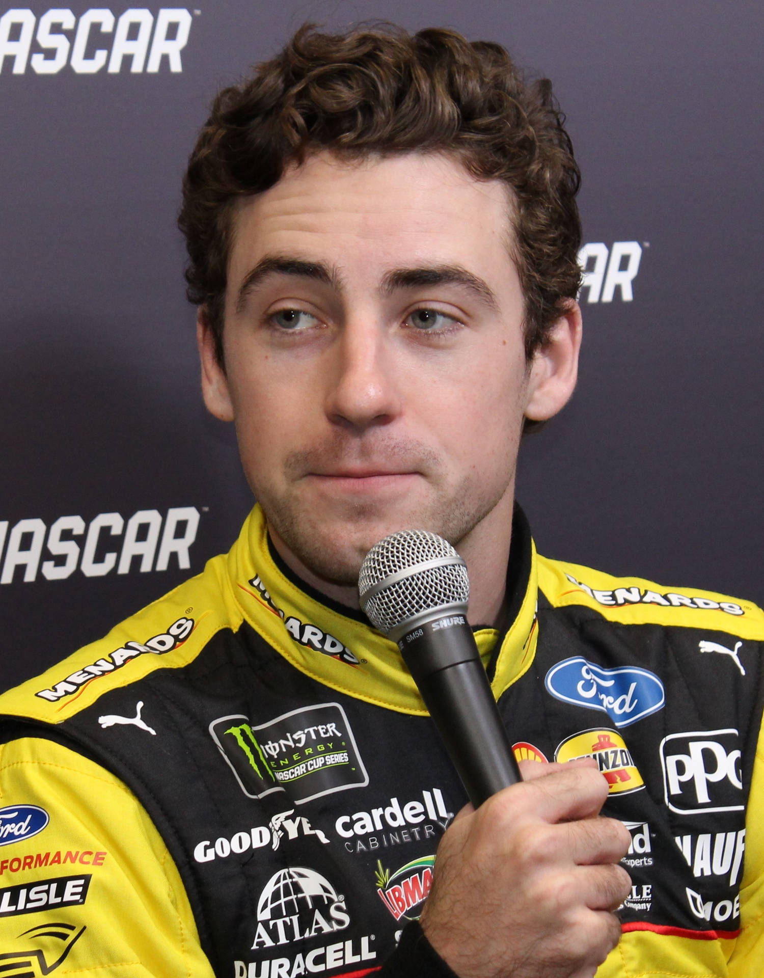 Ryan Blaney Holding Microphone Background