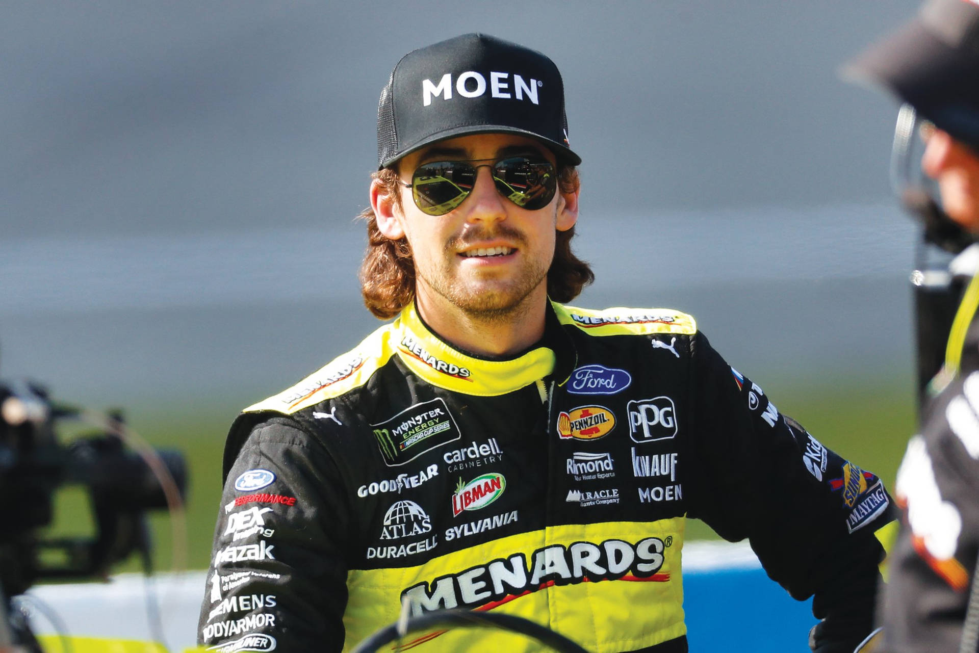 Ryan Blaney Wearing Black Cap Background