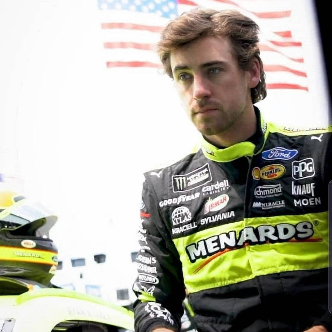 Ryan Blaney Wearing Racing Suit Background