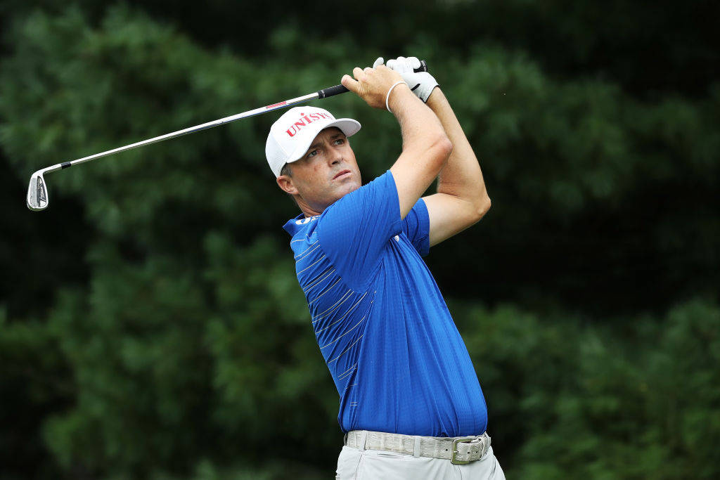 Ryan Palmer Blue Shirt Observing Pitch Background