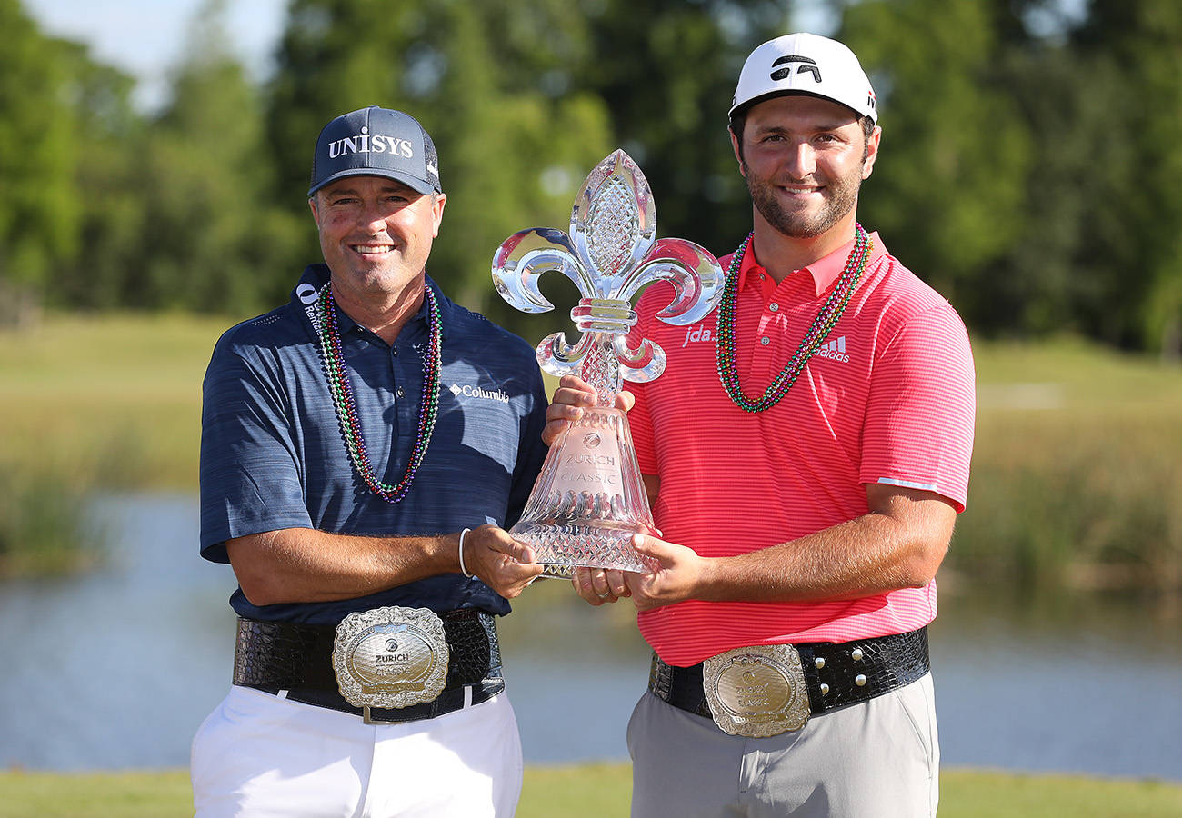 Ryan Palmer Holding Trophy Jon Rahm Background