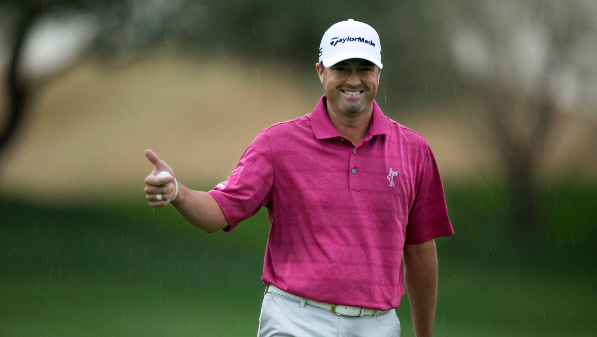 Ryan Palmer Pink Polo Thumbs Up Background