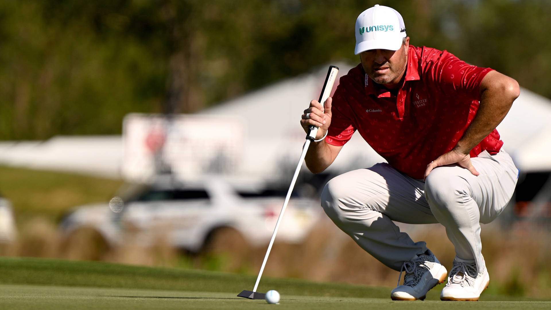 Ryan Palmer Squatting Looking At Ball Background