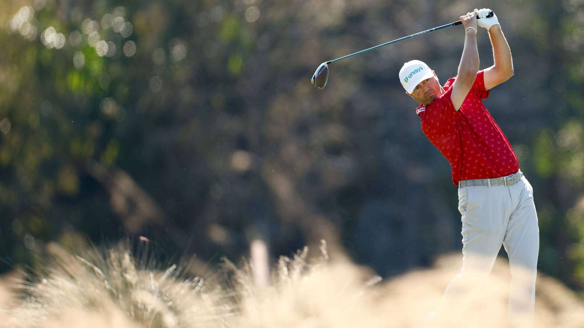 Ryan Palmer With Red Shirt Golfing Background