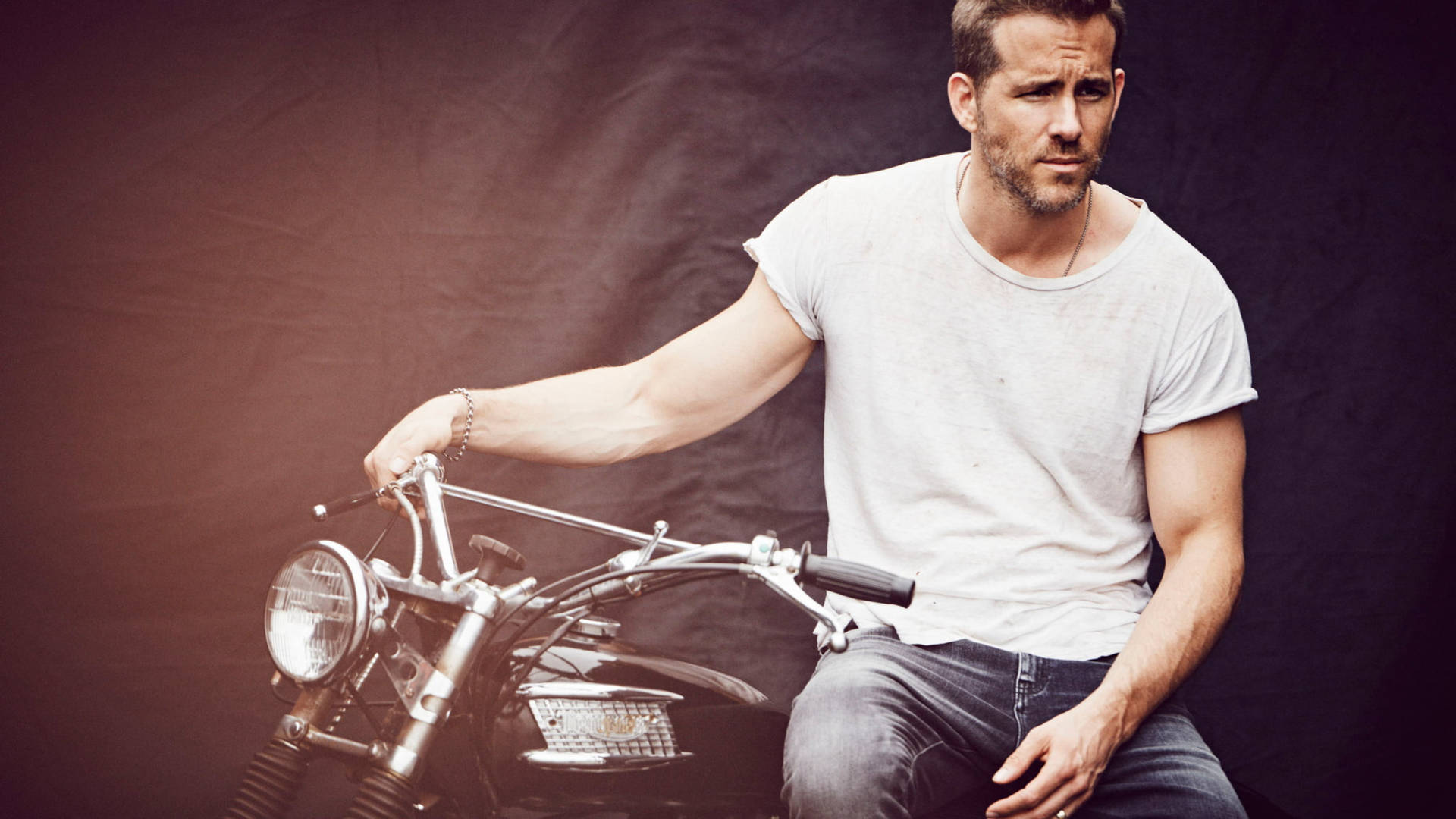 Ryan Reynolds On Motorcycle Background