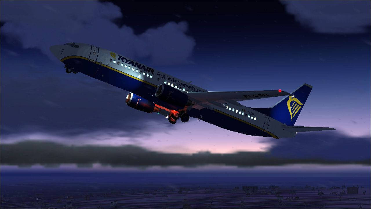 Ryanair Flying At Night Sky Background