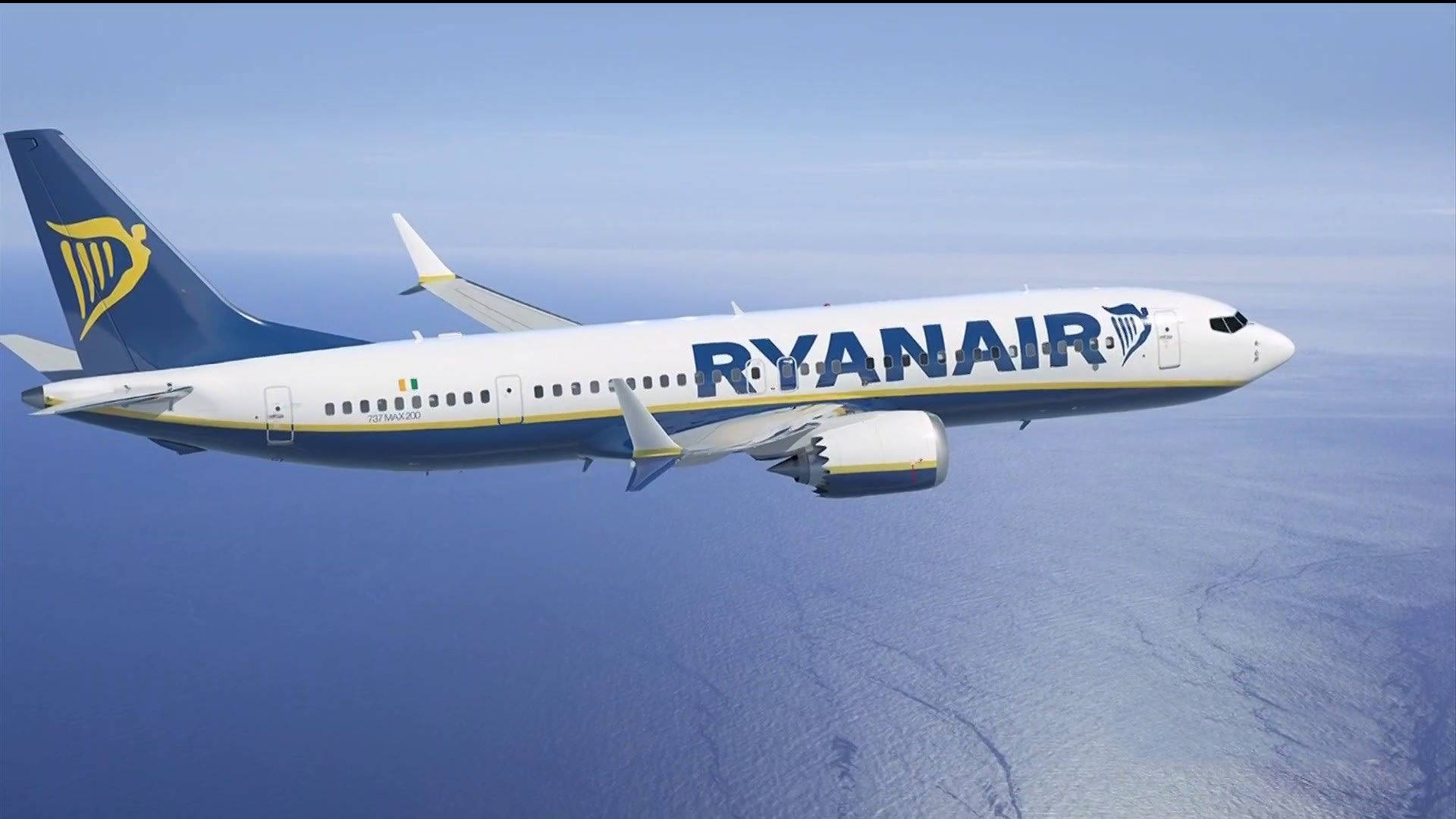 Ryanair Flying Over The Ocean Background