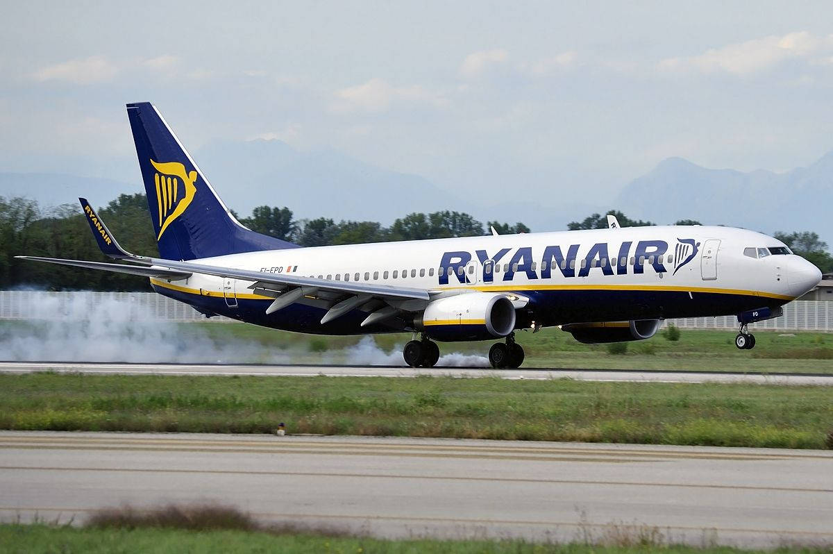 Ryanair On Grassy Runway Background