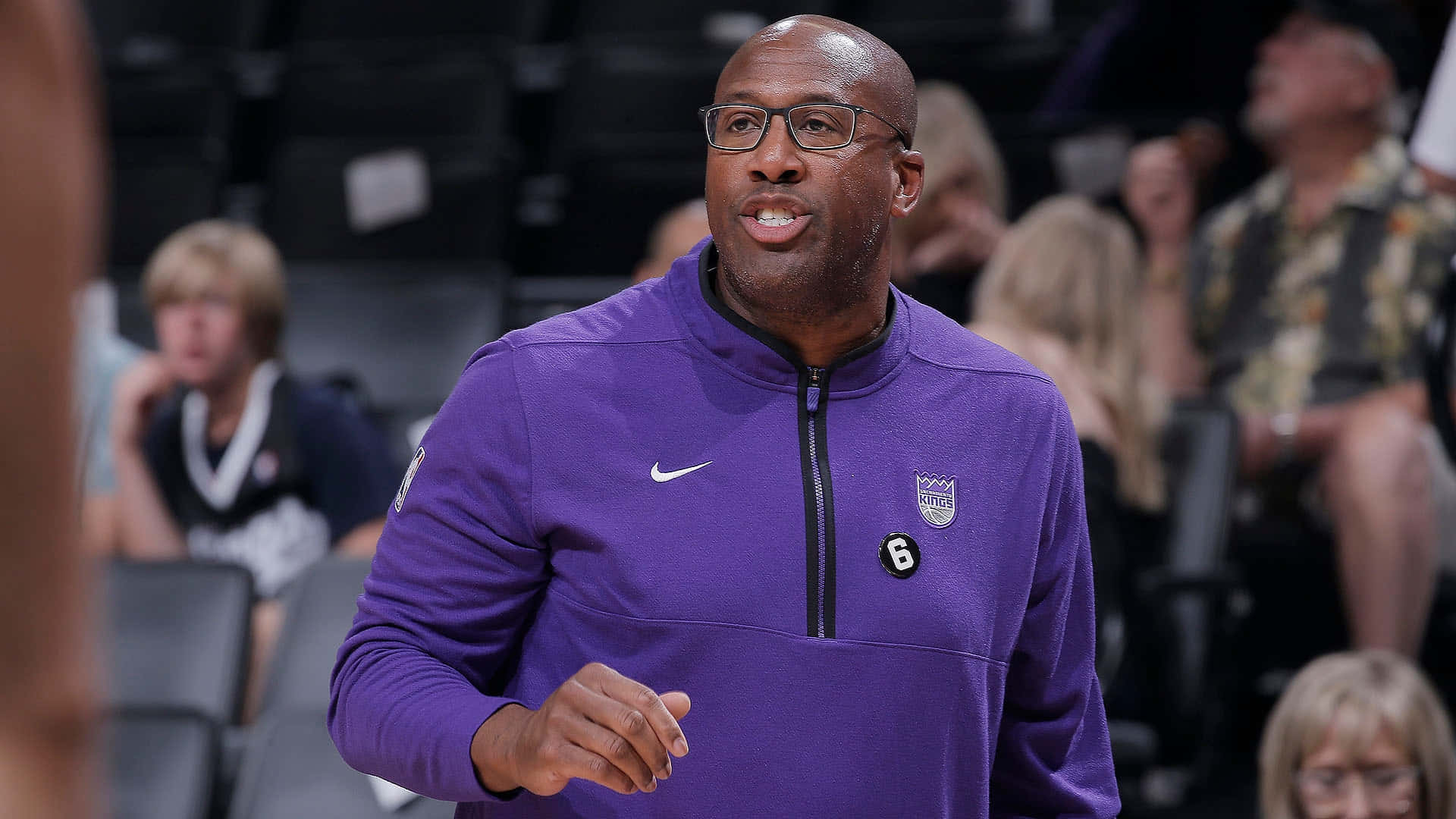 Sacramento Kings Coach Mike Brown Medium Angle Shot Background