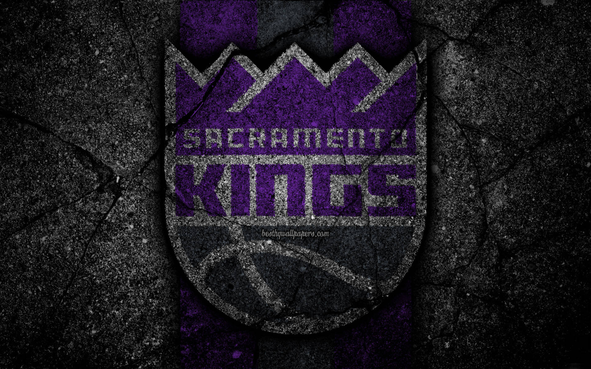 Sacramento Kings Emblem In Cement Wall Background