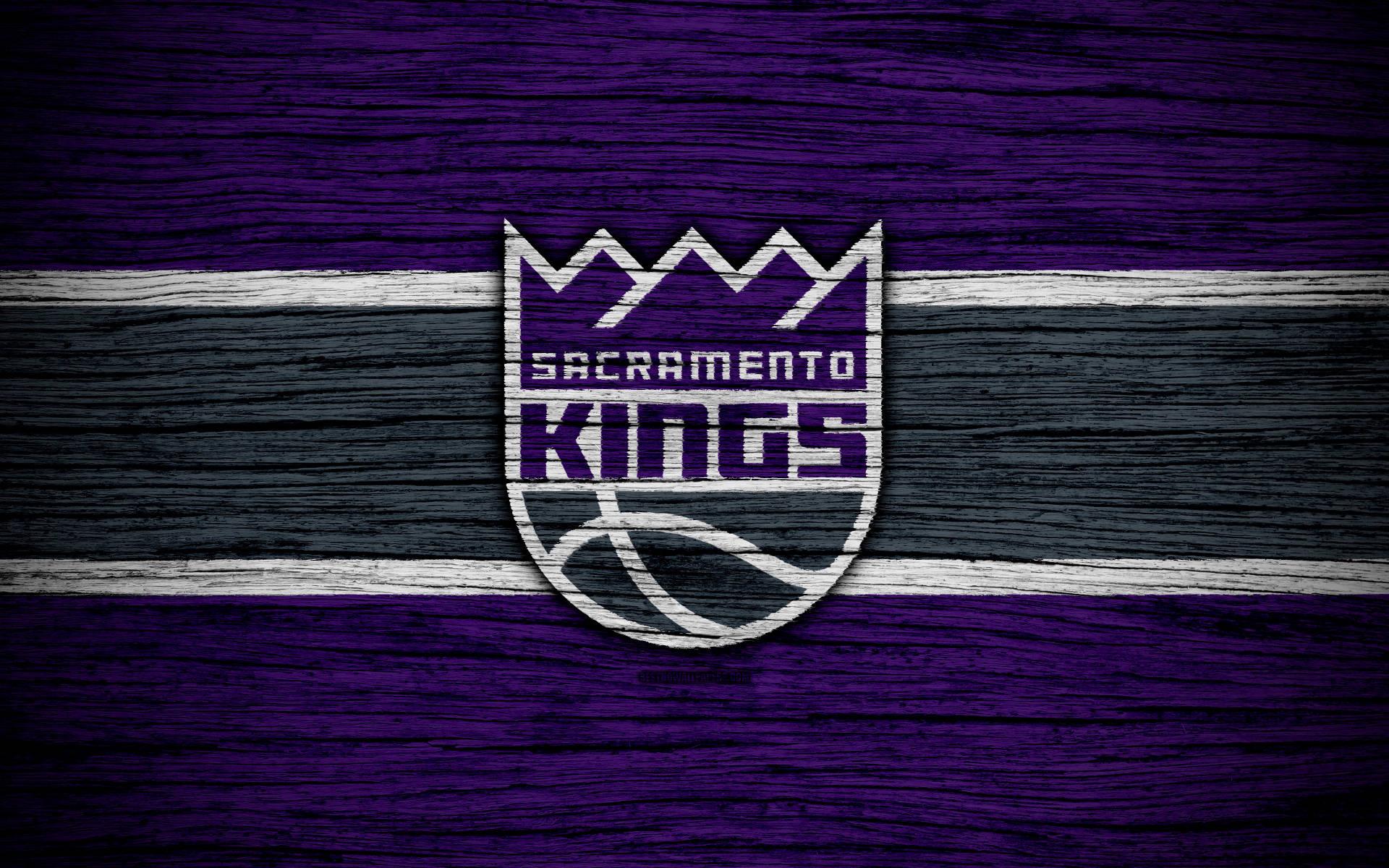 Sacramento Kings Emblem In Wood Background
