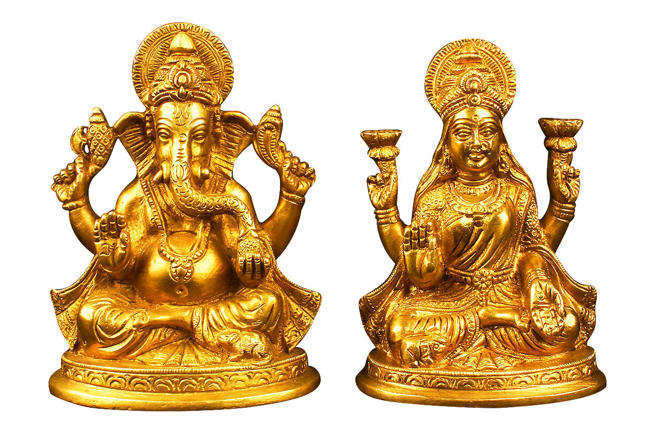 Sacred Golden Figurines Of Ganesh And Lakshmi