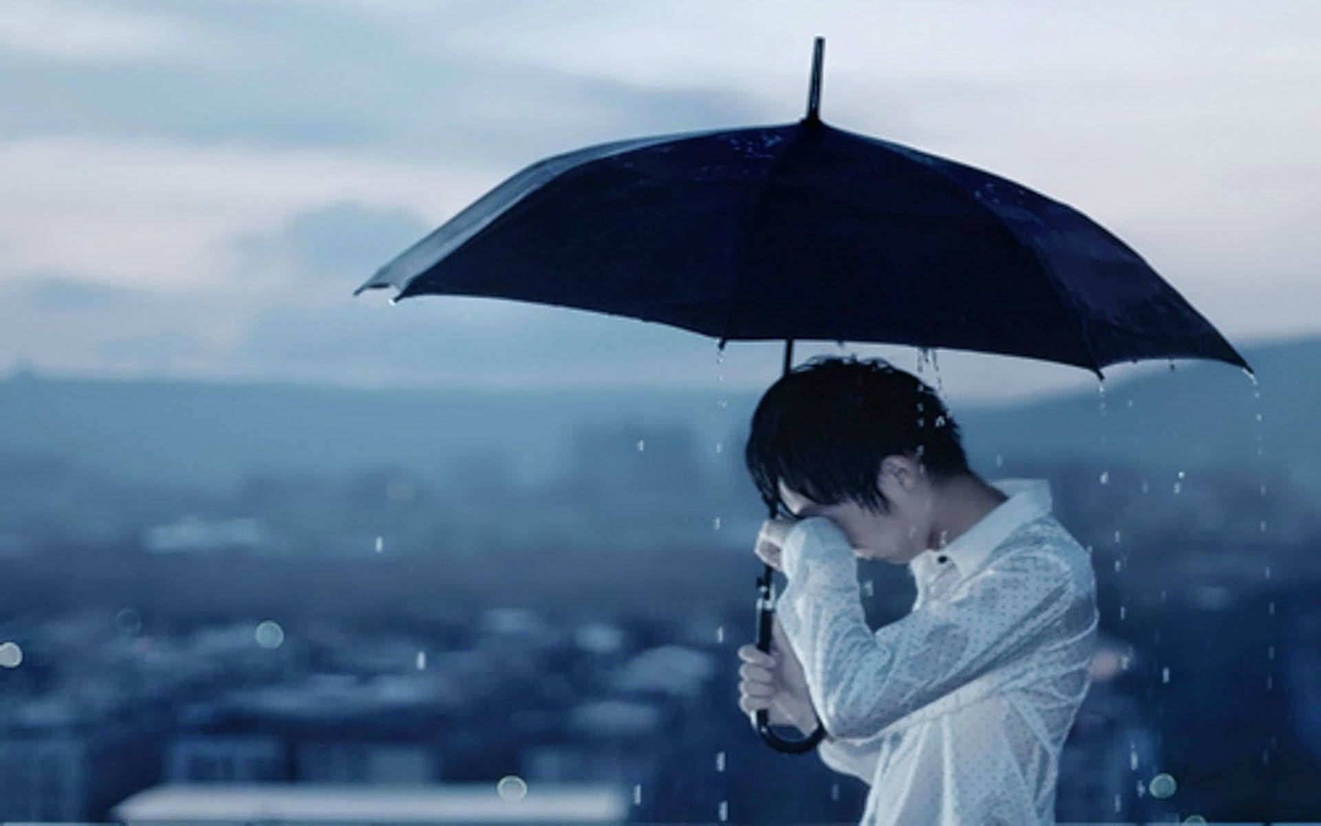 Sad Boy With Umbrella Background