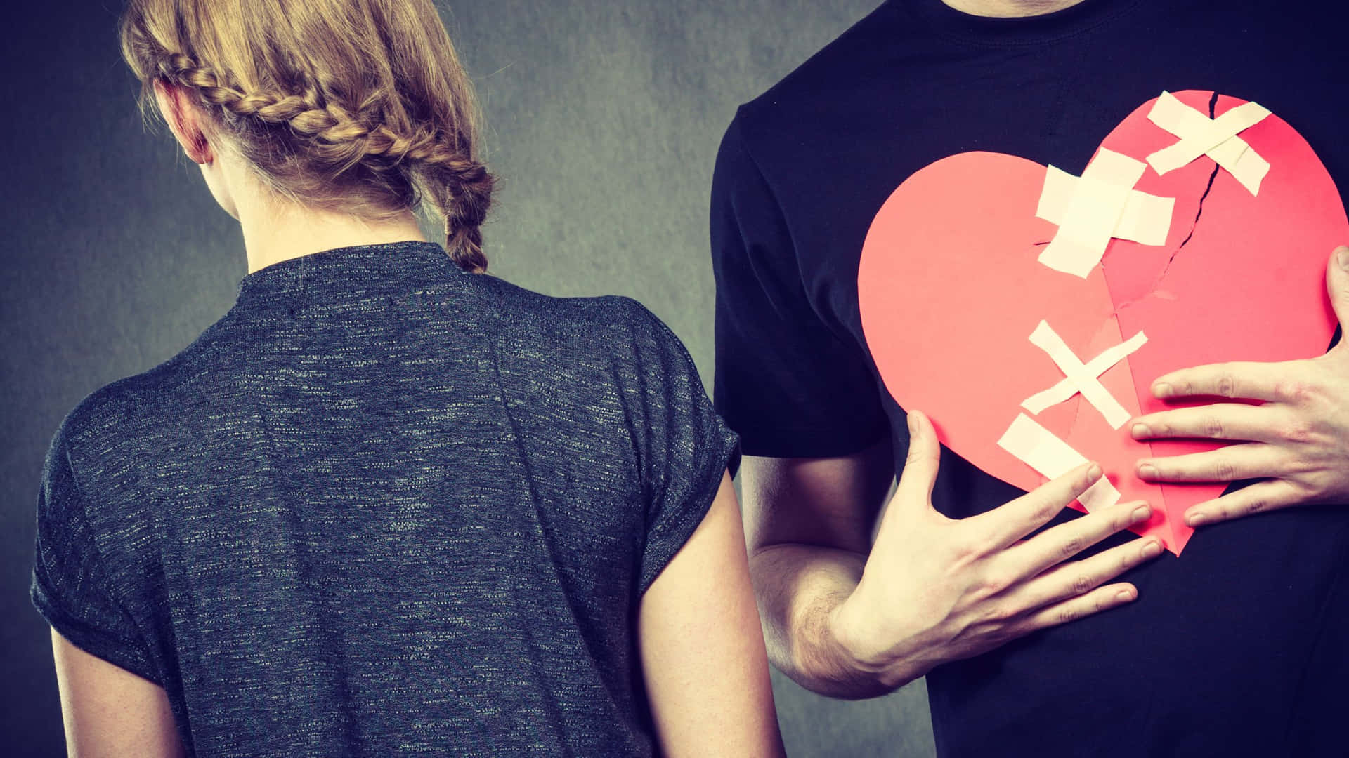 Sad Couple Bandage Heart Cardboard Background