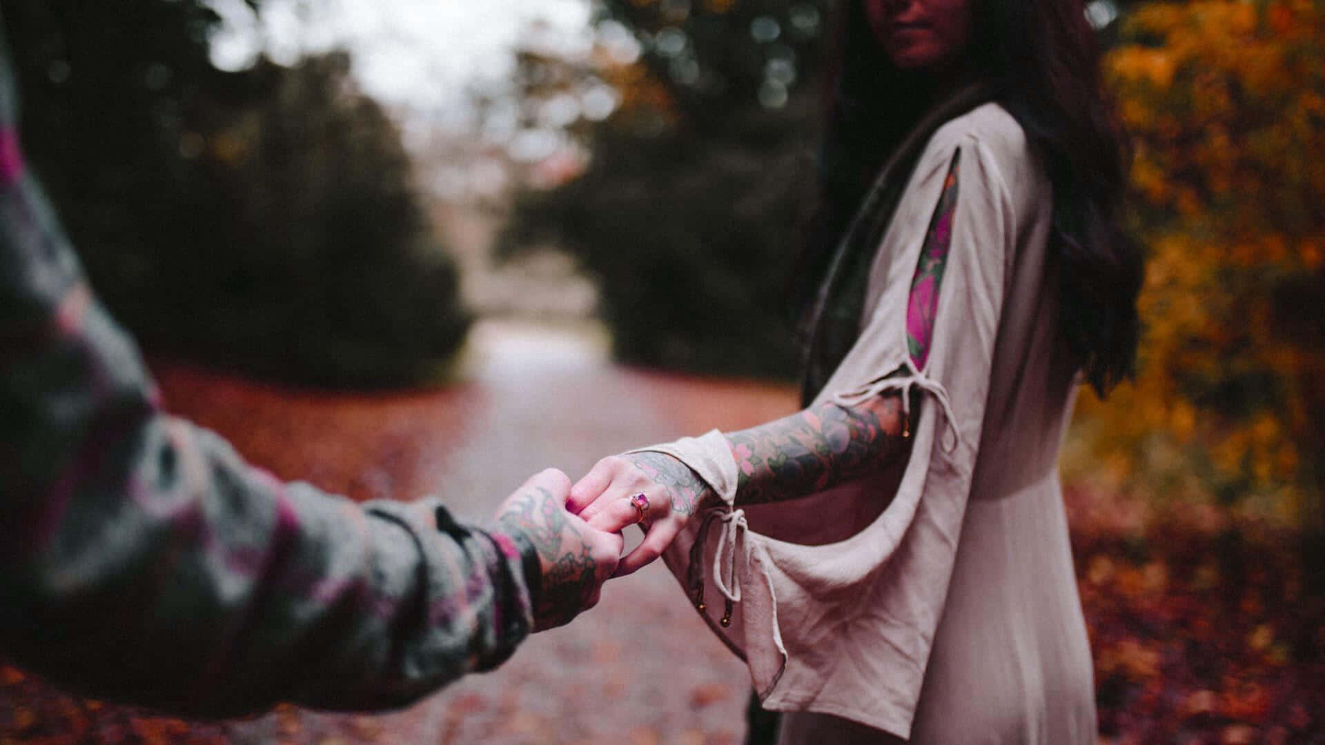 Sad Couple Holding Hands Background