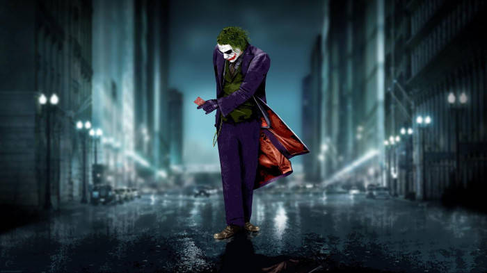 Sad Joker Walking With A Card Background