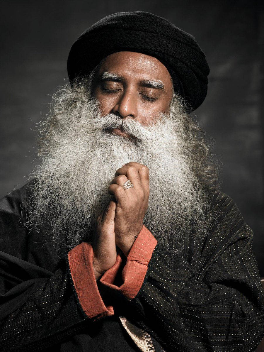 Sadhguru Wearing Dark Garb Background