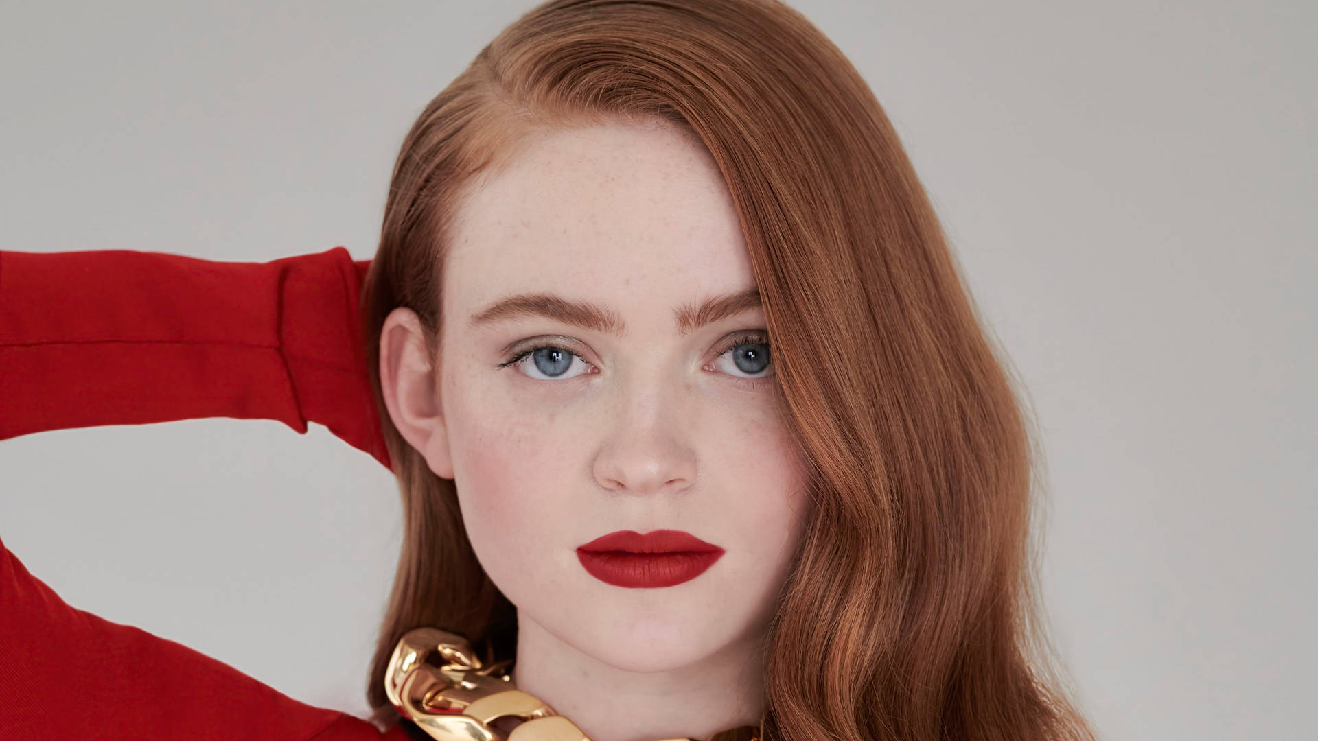 Sadie Sink In All Red Background