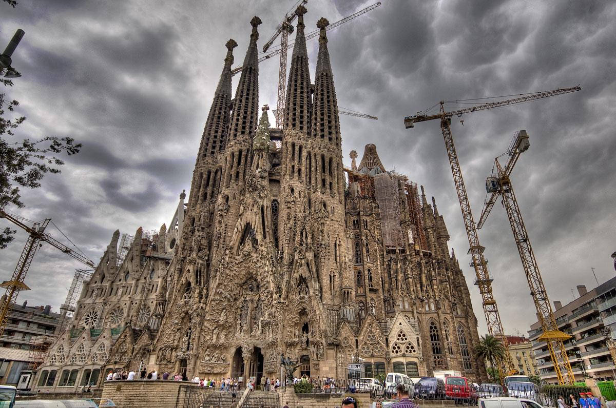 Sagrada Familia With Cranes Background