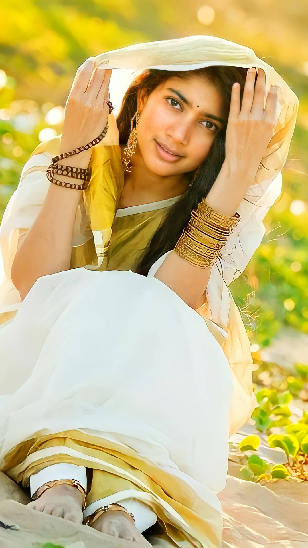 Sai Pallavi Exuding Elegance In A White Outfit. Background