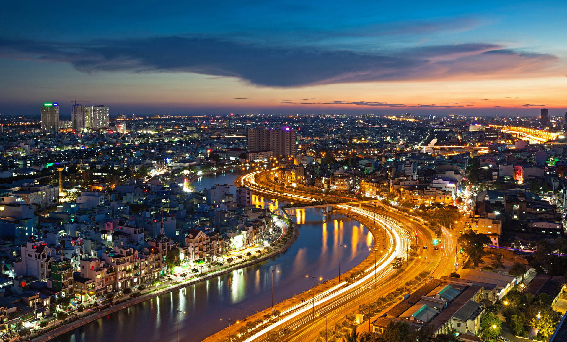 Saigon River And Night City View In Vietnam Background