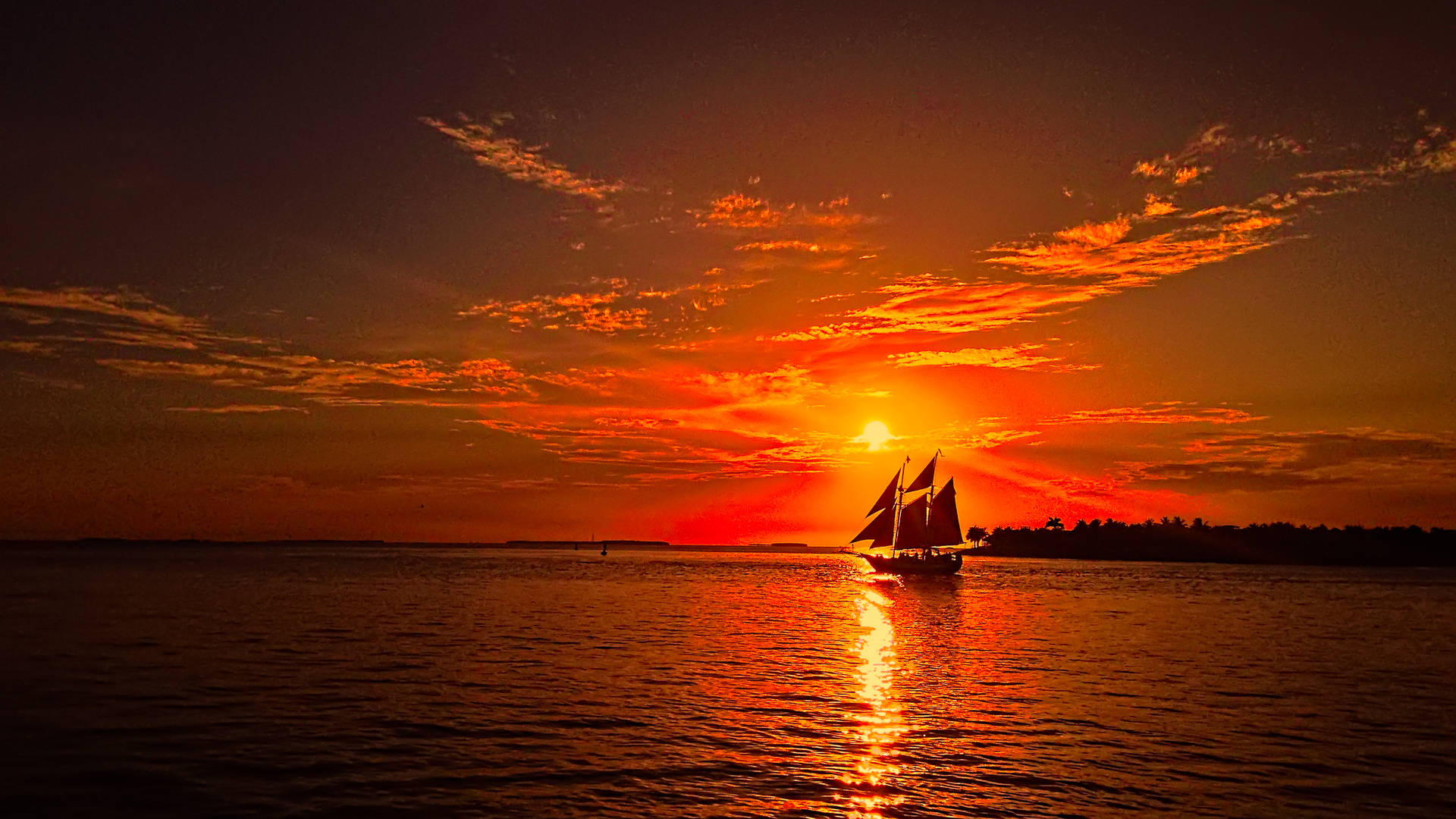 Sailing Ship At Sunset Background
