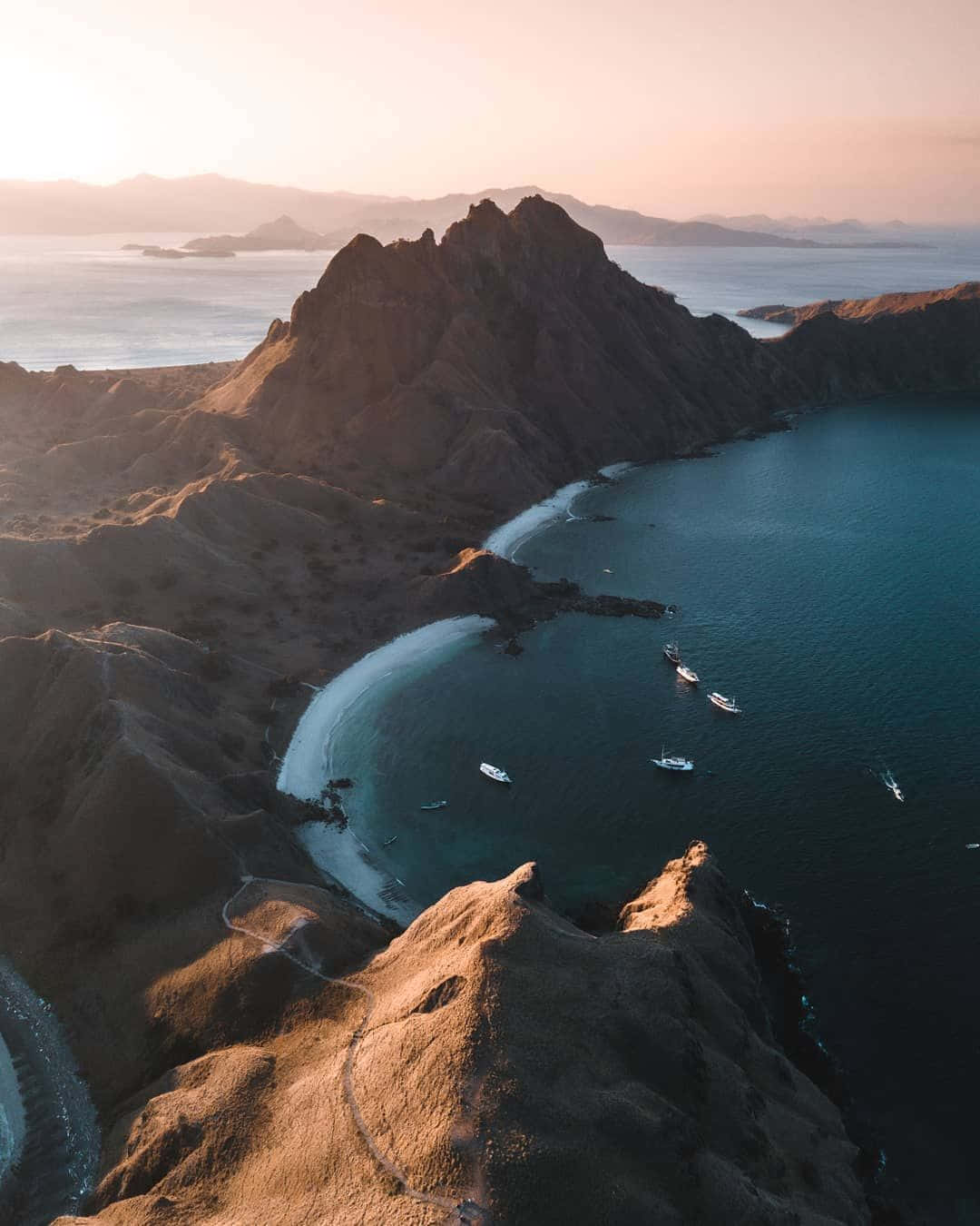 Sailing Ships On Komodo Island Background