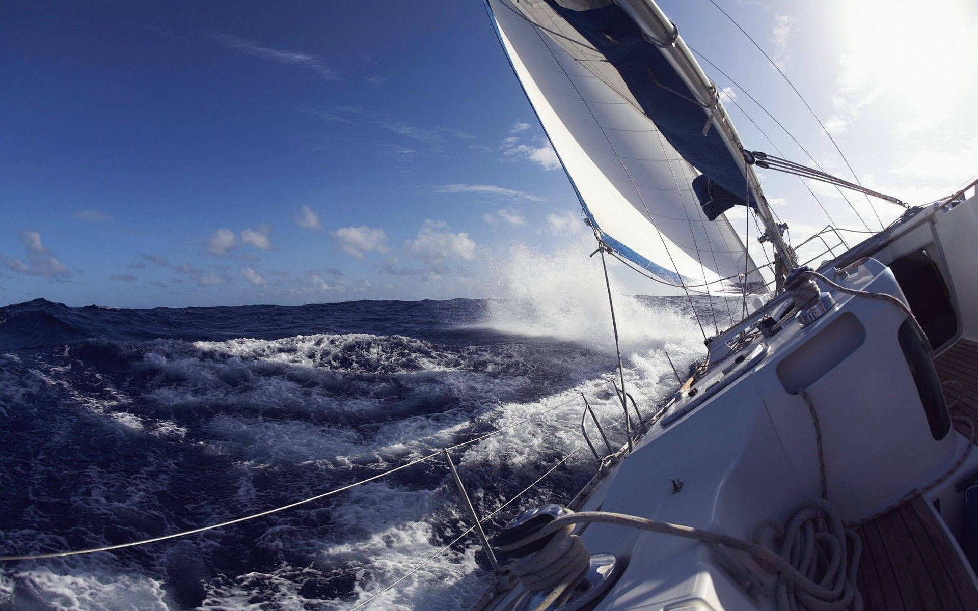 Sailing Yacht Braving Waves