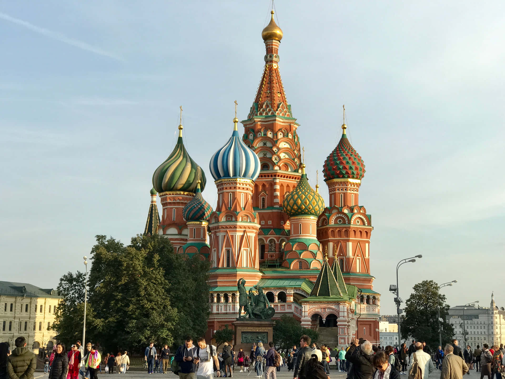 Saint Basil's Cathedral Surrounded By Tourists Background