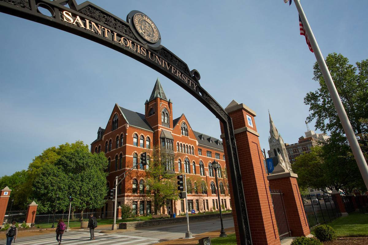 Saint Louis University Buildings And Arch Background