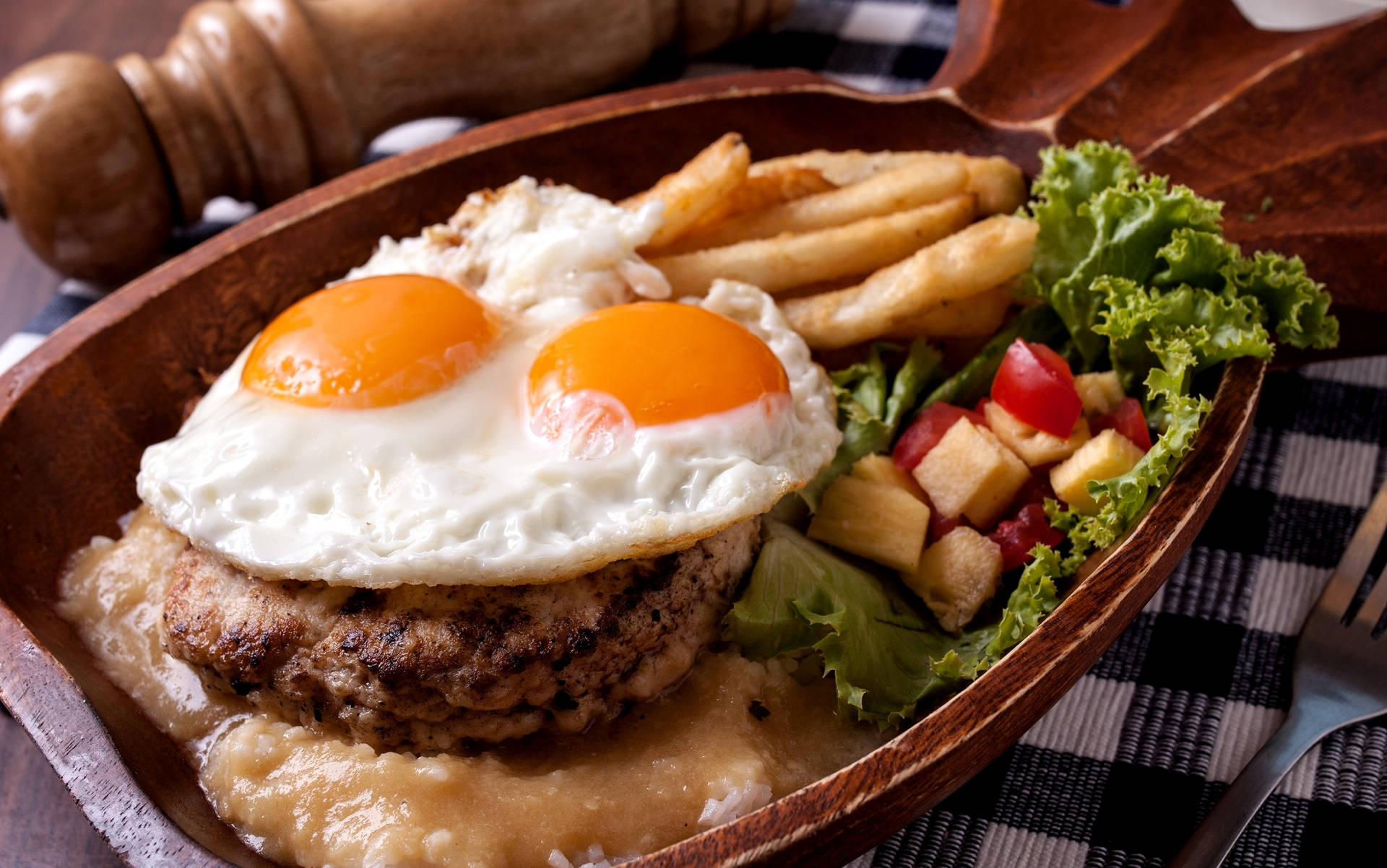 Salisbury Steak Crowned With Sunny Side Up Eggs