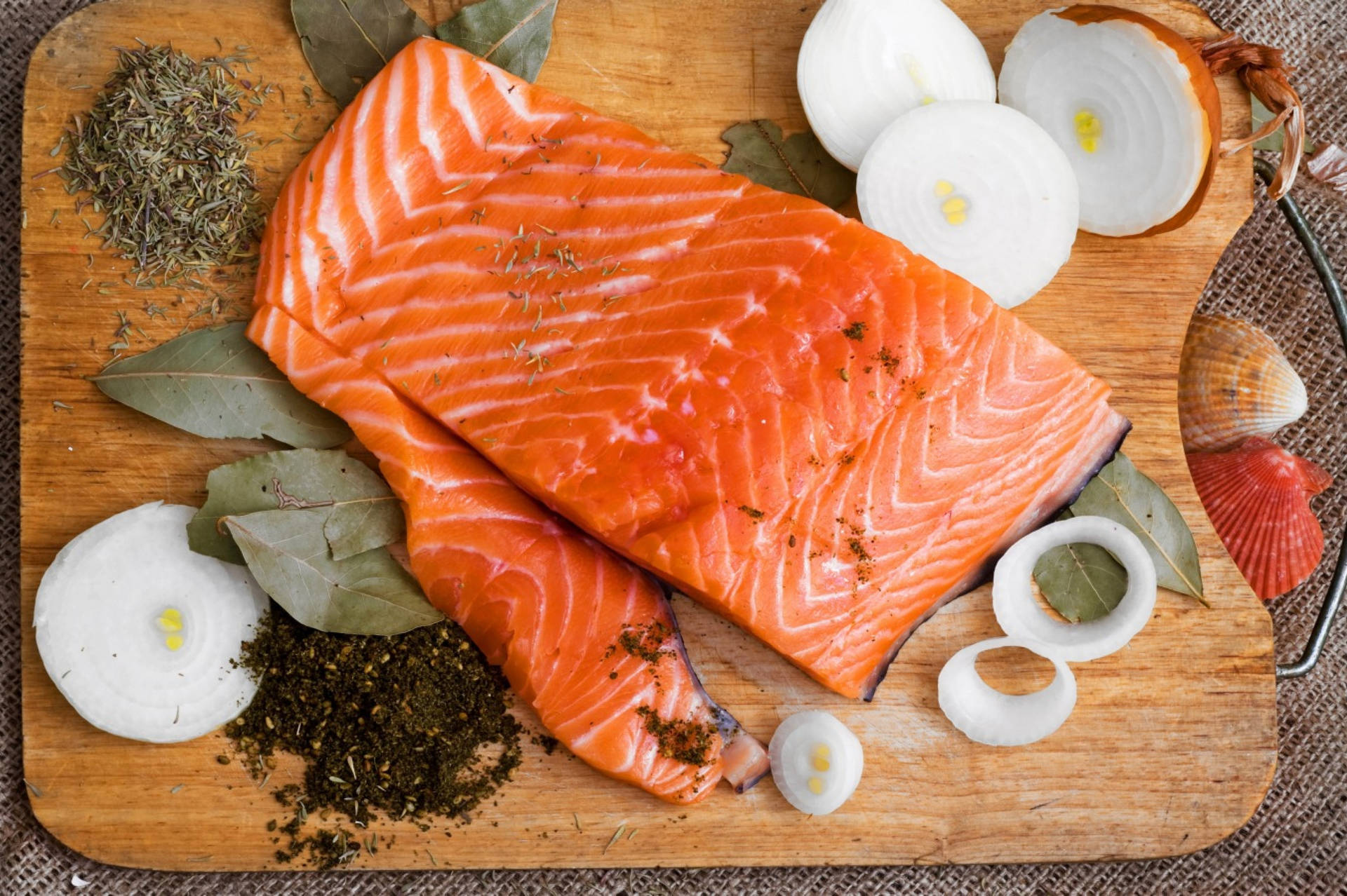 Salmon Onion Peppercorn On Chopping Board Background