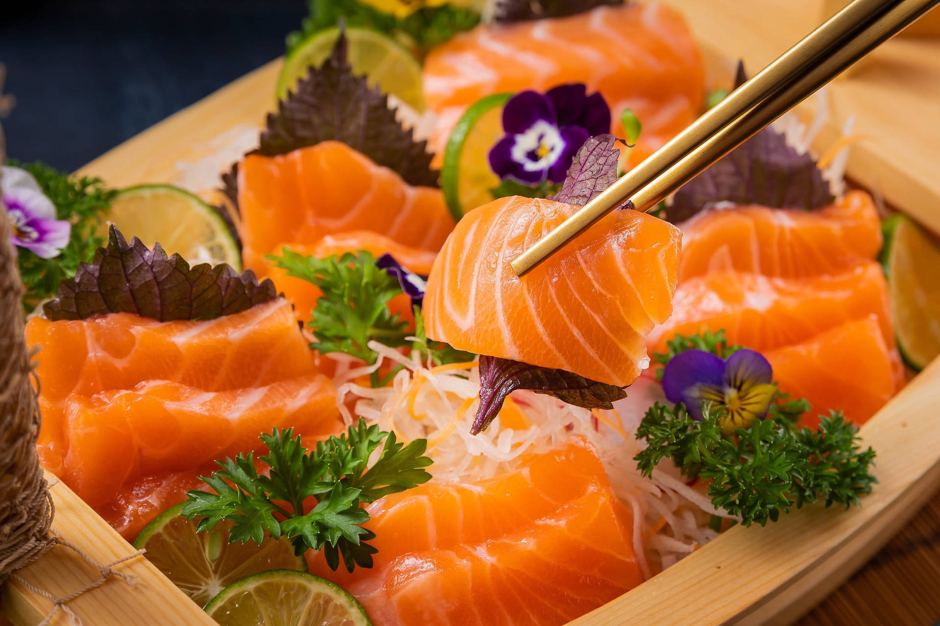 Salmon Slices And Vegetables With Chopsticks Background