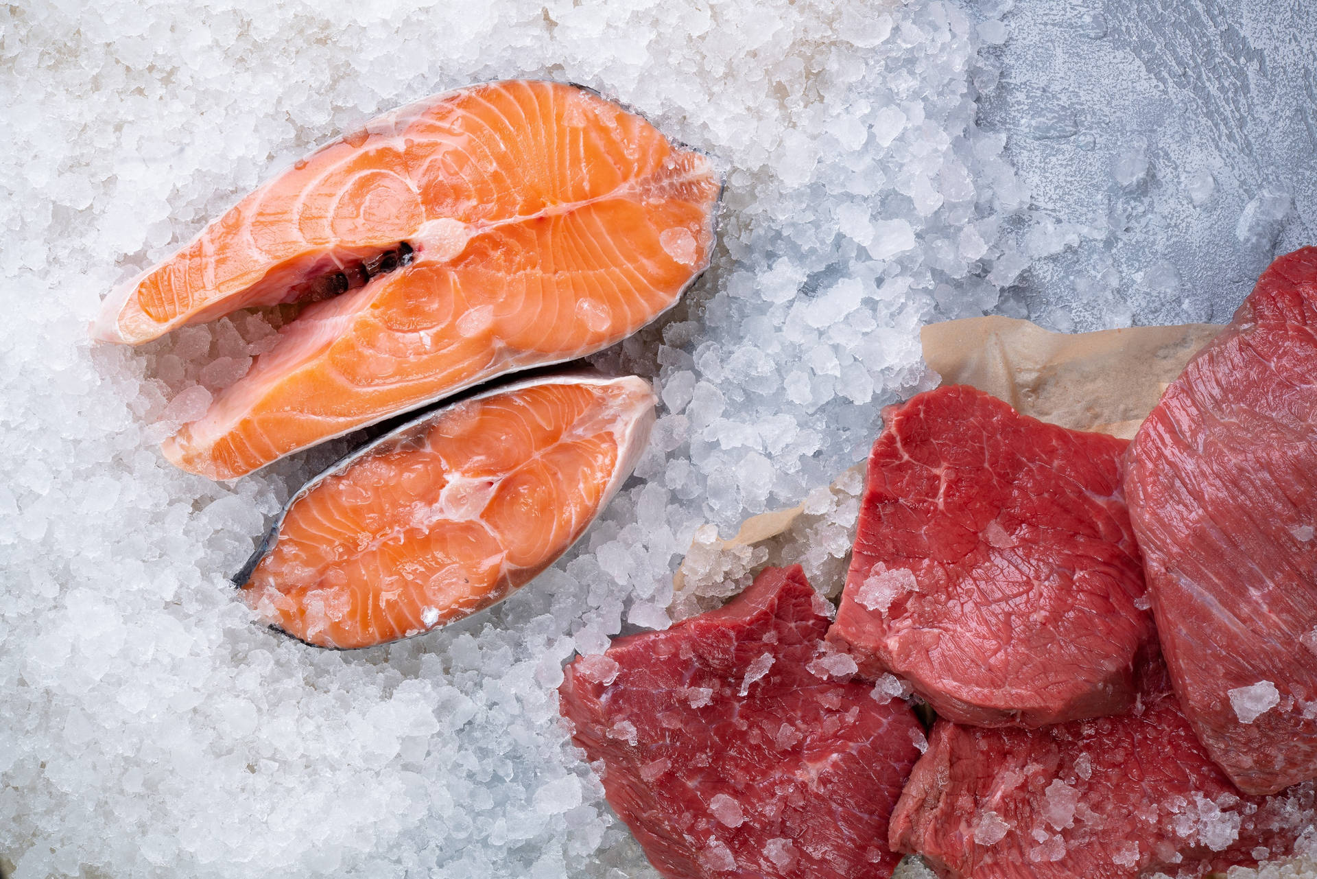 Salmon Steaks With Ice Background