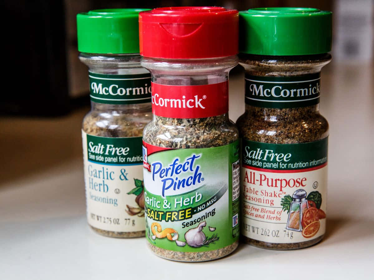 Salt Free Mccormick Spices In Small Bottles Background