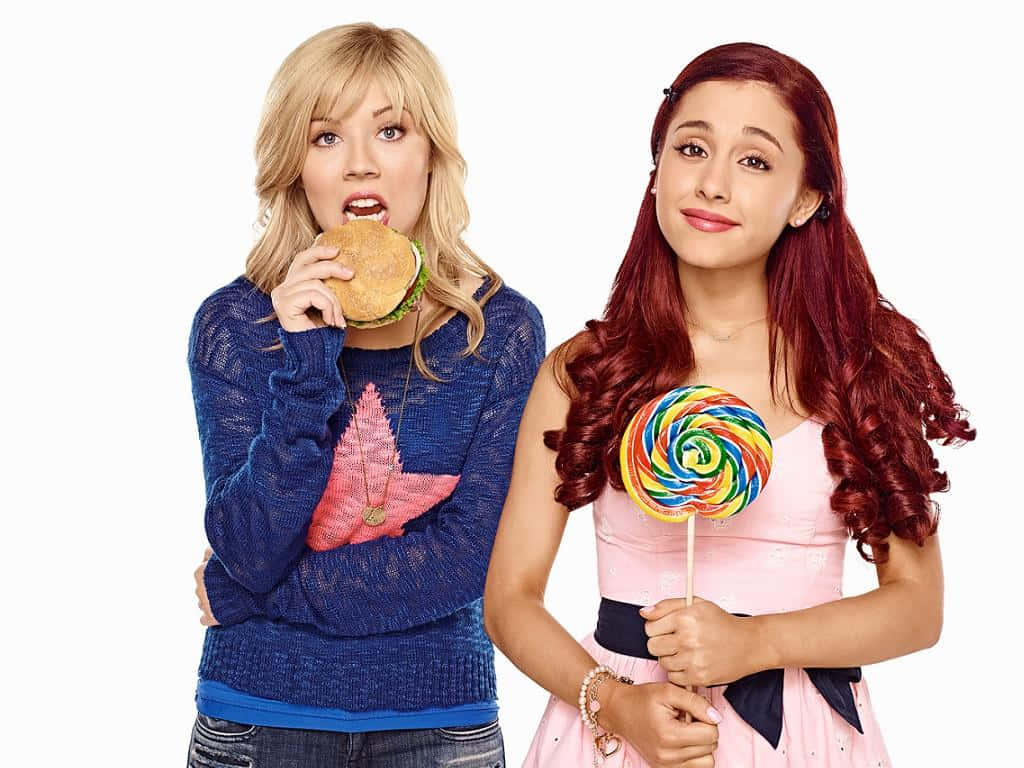 Sam And Cat Holding Lollipop Background