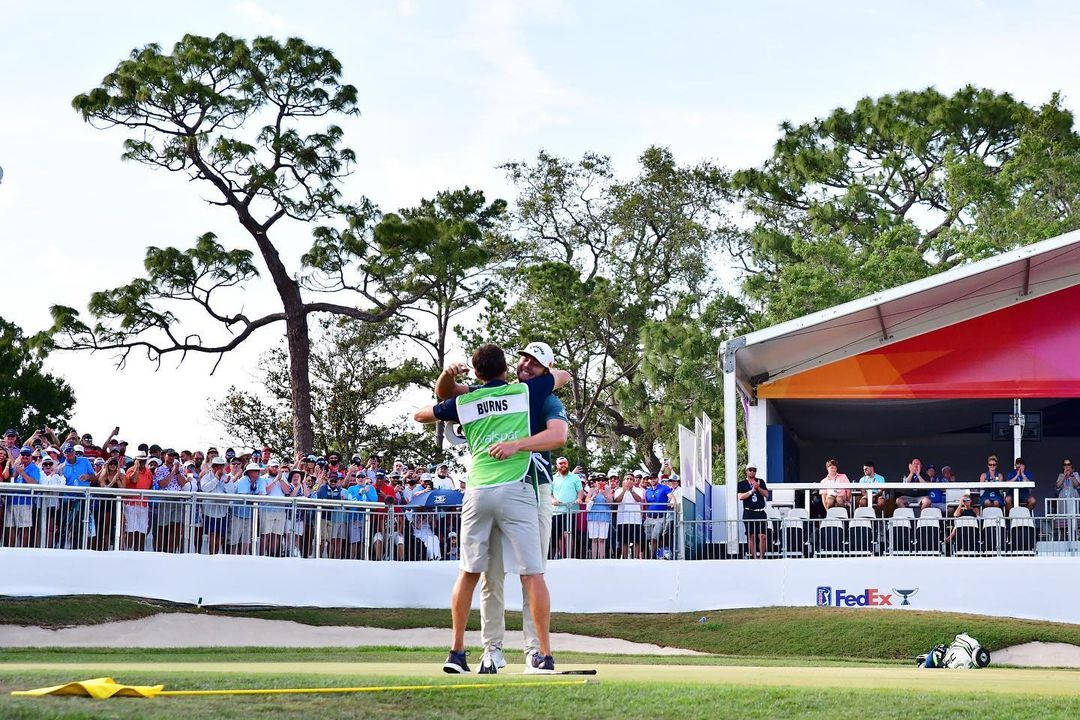 Sam Burns Hugging Caddie Background