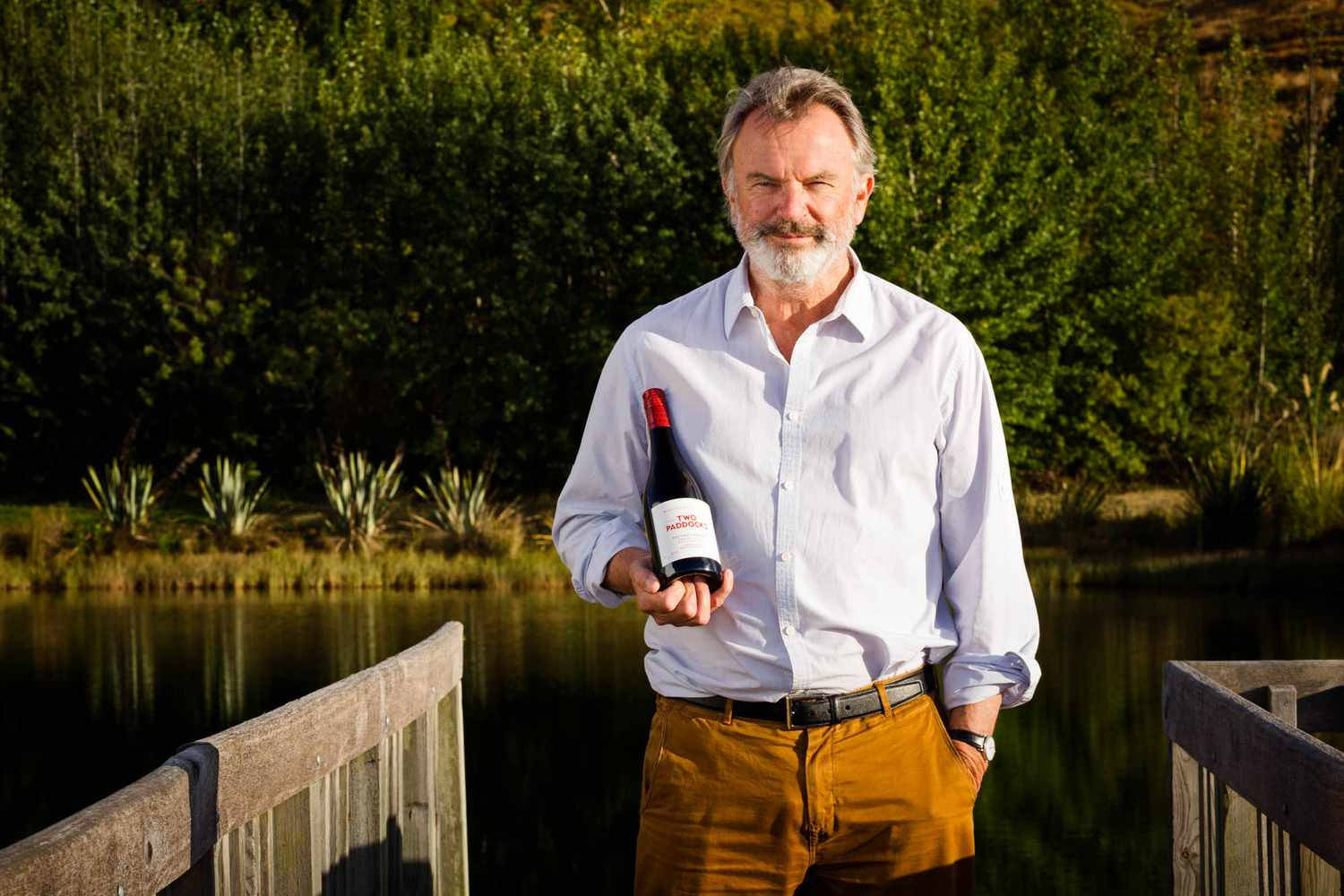 Sam Neill For Two Paddocks Wine Background